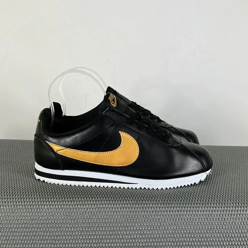 Nike black gold white classic Cortez lace up athletic shoes women’s size 7